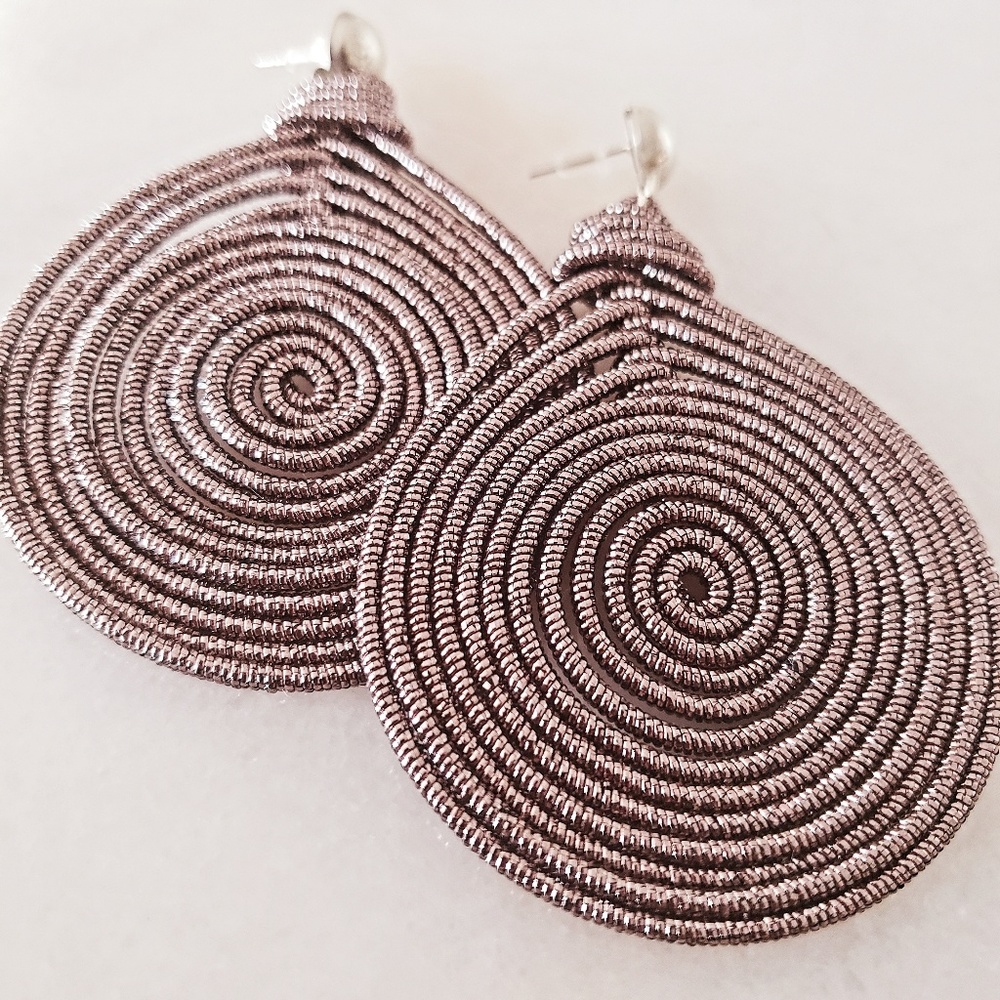 Bronze spiral spring statement earrings